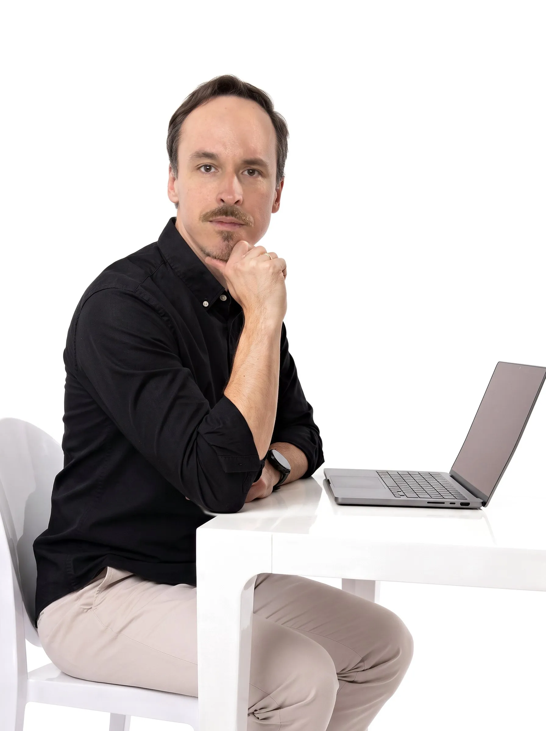 Krystian Gadomski in a white studio